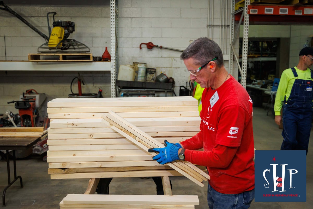 Sleep in Heavenly Peace bed build gets 91 kids off the floor.