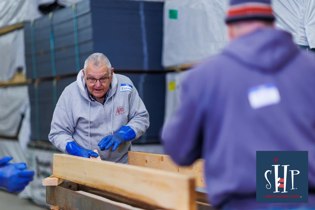 Sleep in Heavenly Peace bed build gets 91 kids off the floor.