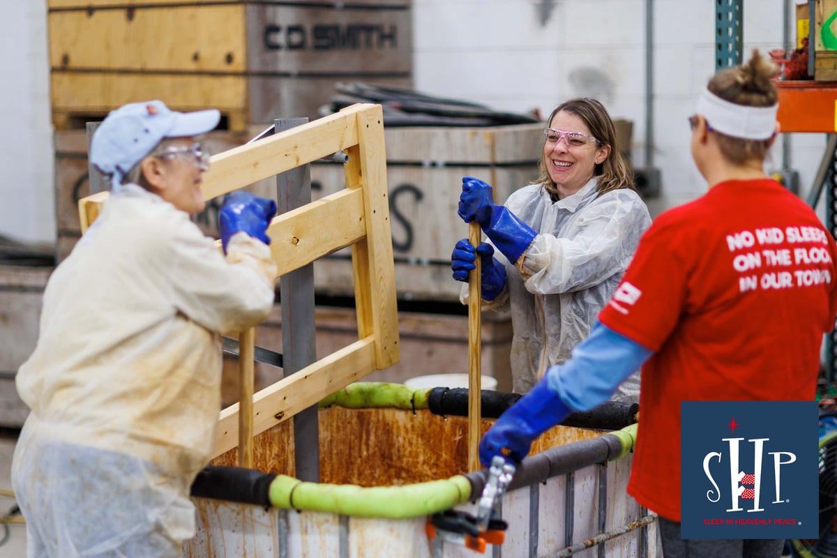 Sleep in Heavenly Peace bed build gets 91 kids off the floor.